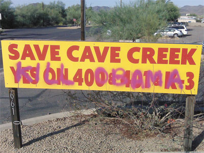 defaced sign